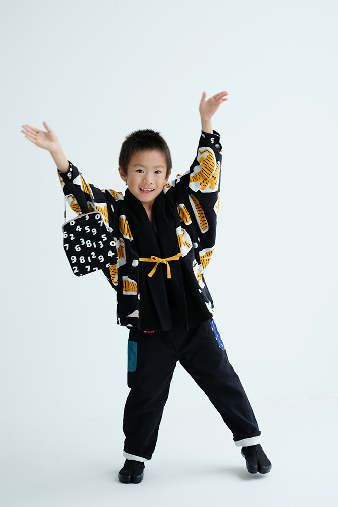 ハレの日を彩る、とらの羽織がポイントのコーデ